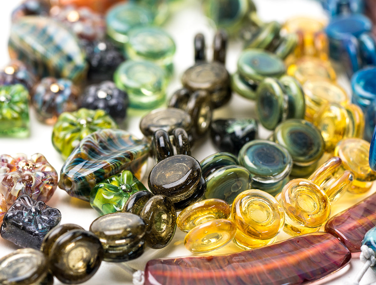 Multi-colored glass beads used for jewelry making crafts
