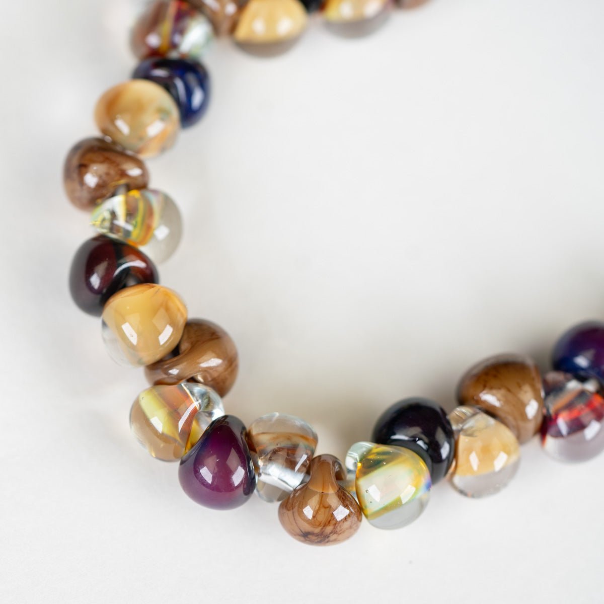 Multicolored beaded bracelet on a white background