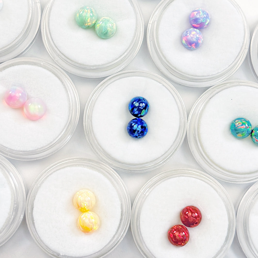 A variety of paired opal bead by Unicorne Beads