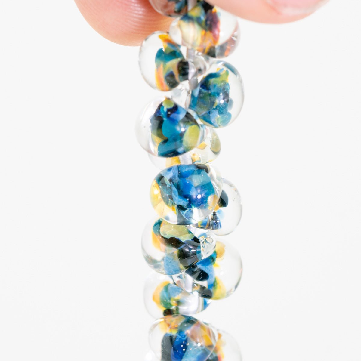 Handmade Coral Flourish teardrop beads by Unicorne Beads