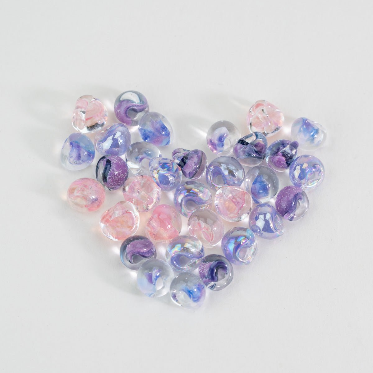 Handcrafted Valentine teardrop glass beads in lavender pink and periwinkle tones
