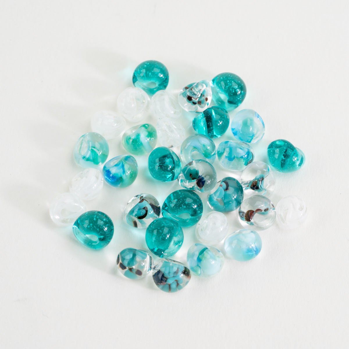 Ocean Veil palette teardrop glass bead tube with teal, aqua, and clear handmade beads