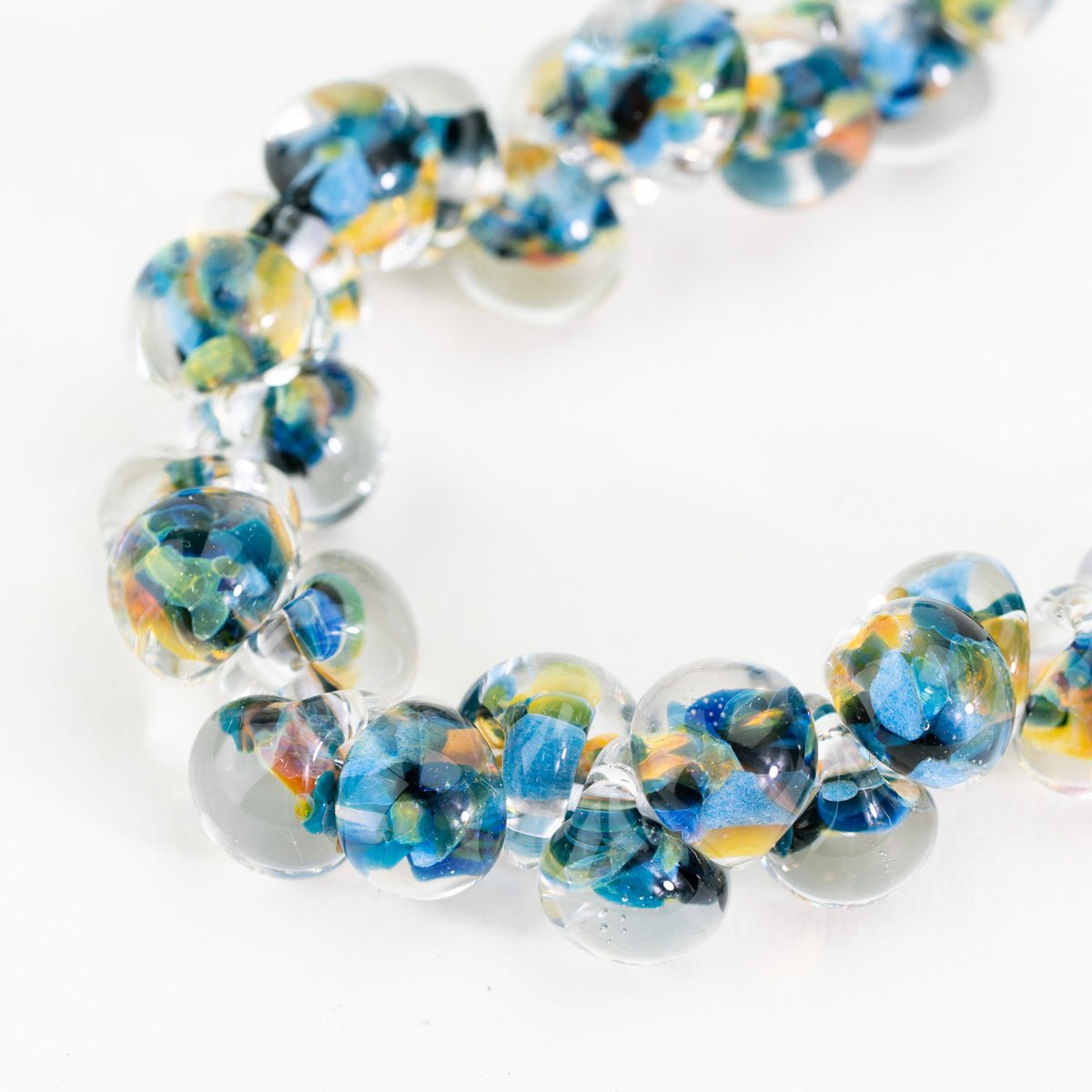 Coral Flourish teardrop beads from the Exotic Series made with handmade lampwork glass