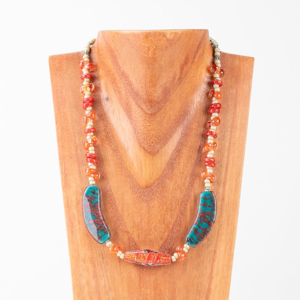 Glass bead necklace featuring Unicorne beads