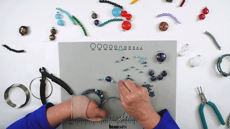 Adding different Unicorne Beads to memory wire bracelet