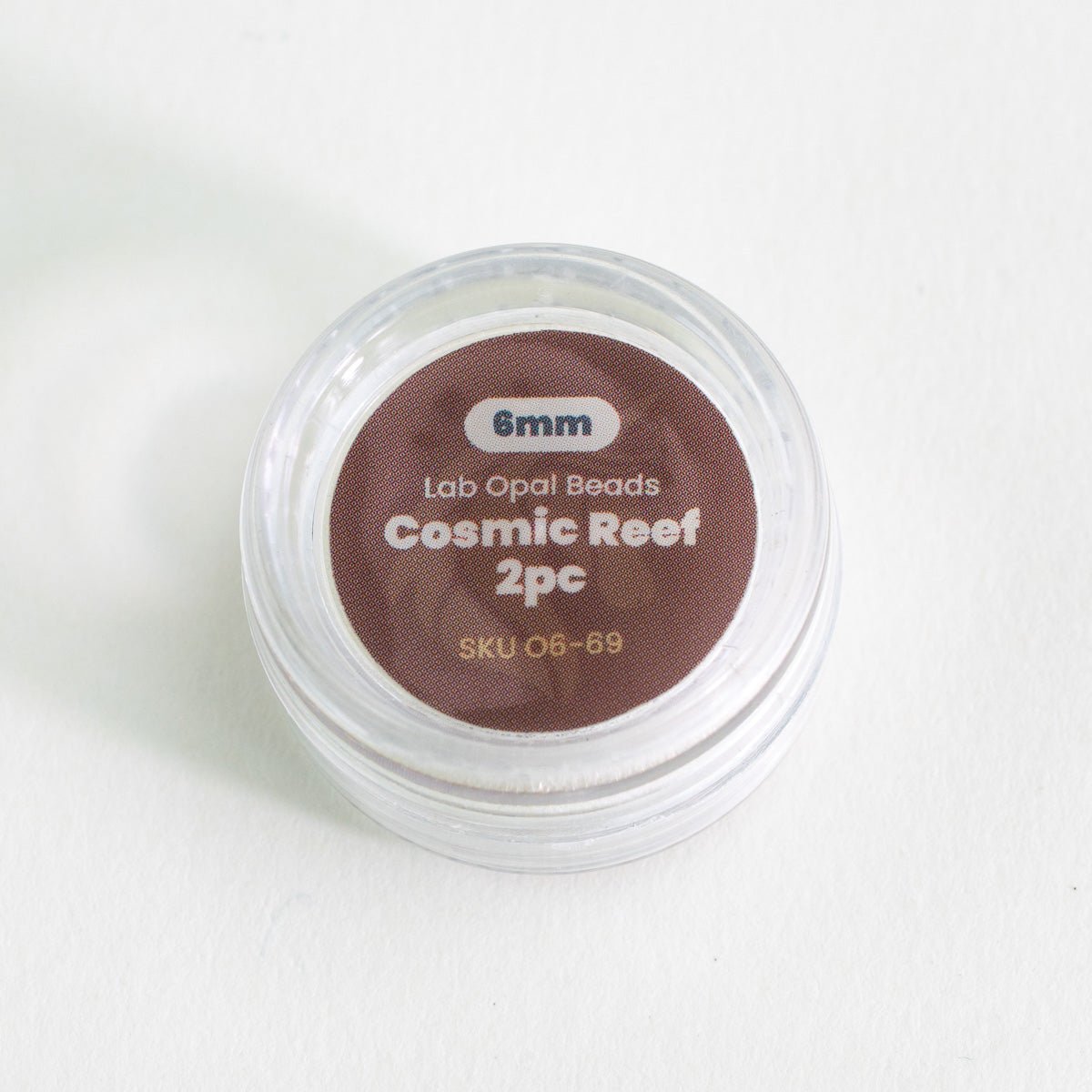 Cosmic Reef themed opal beads packaging