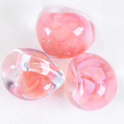 A group of jumbo sized glass teardrop beads made by Unicorne Beads