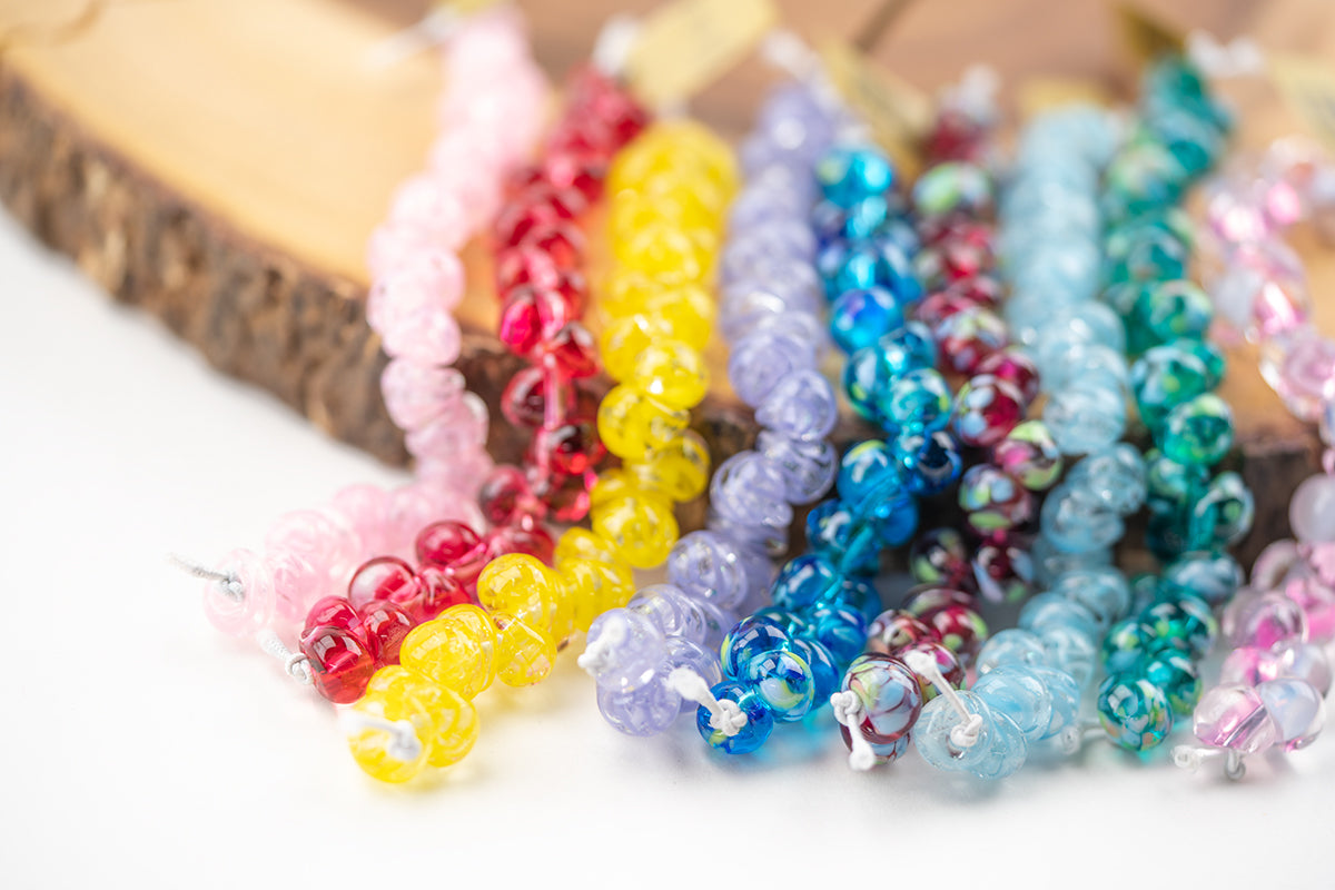 A group of newly released teardrop glass beads crafted by Unicorne Beads