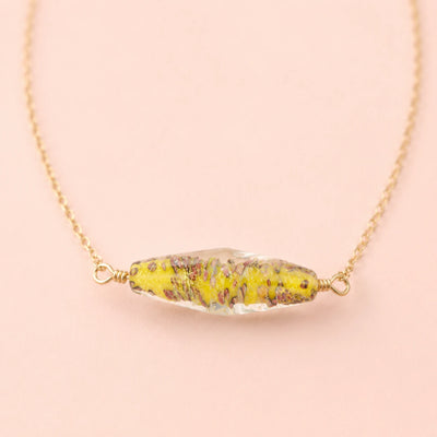 Glass Bicone Beads displayed as a focal bead on a necklace handmade from Unicorne Beads