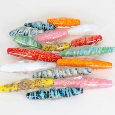Bicone glass beads created by Unicorne Beads displayed across 10 different glass colors