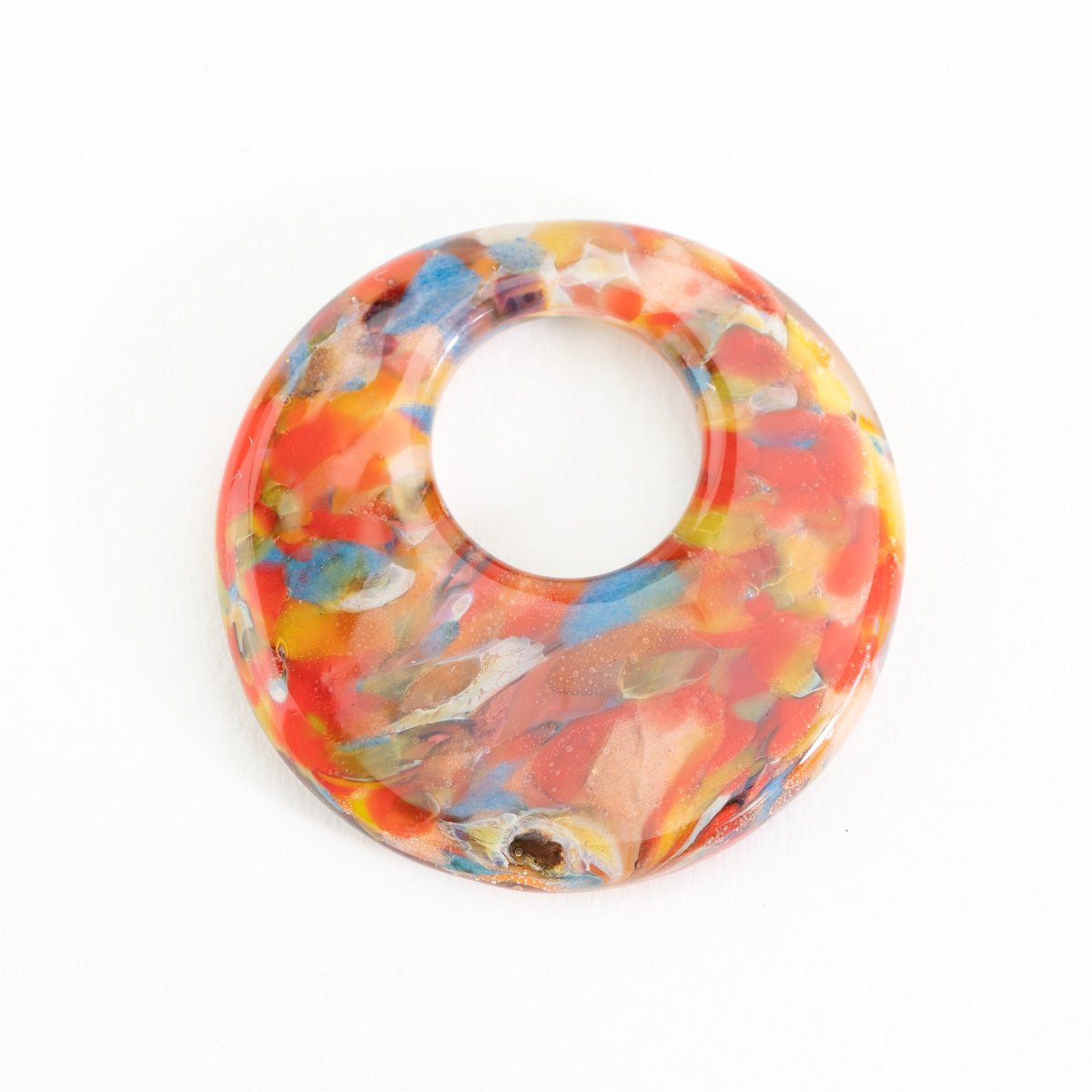 Size comparison of Bird of Paradise halo disk glass beads for jewelry making