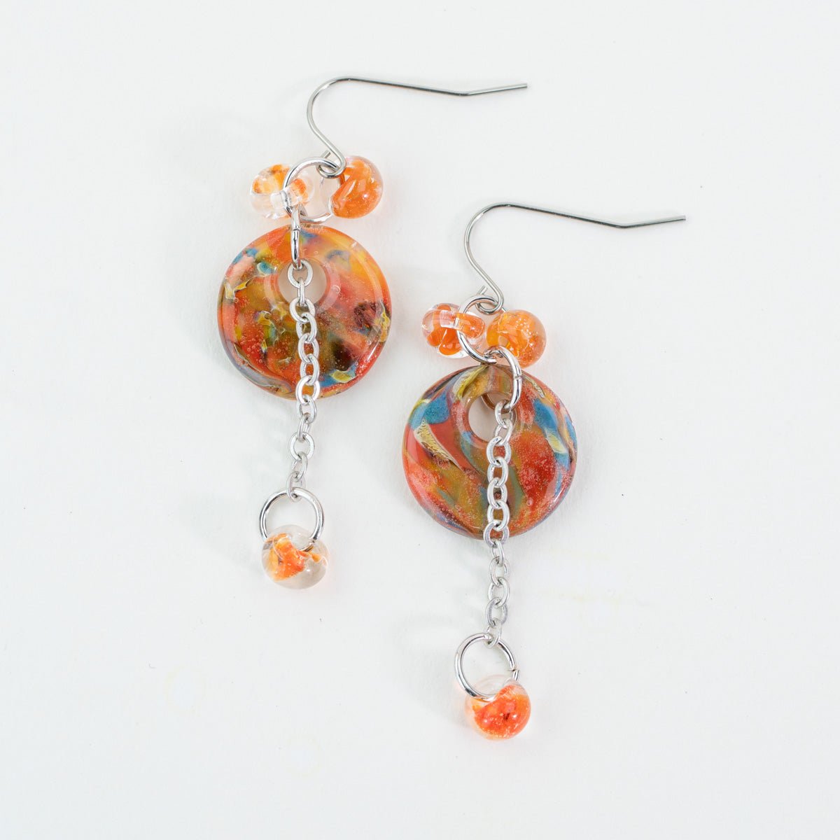 Finished Bird of Paradise halo drop earrings made with handmade glass beads