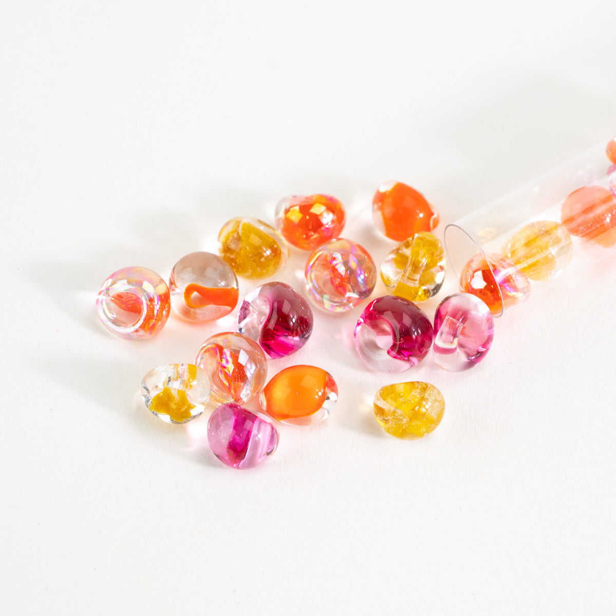 Mixed teardrop glass beads in citrus orange golden yellow and pink colors