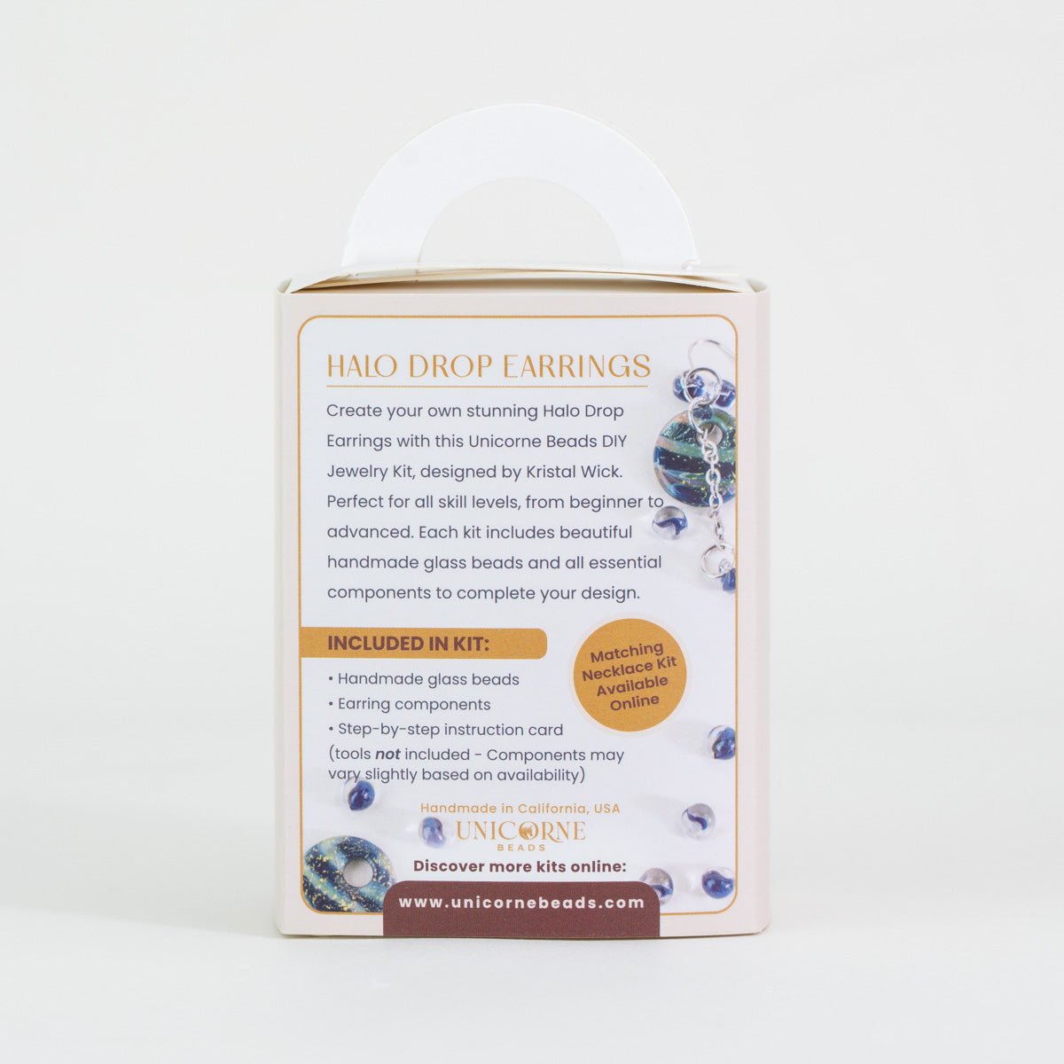 Handmade blue glass beads included in deep lagoon halo earring kit