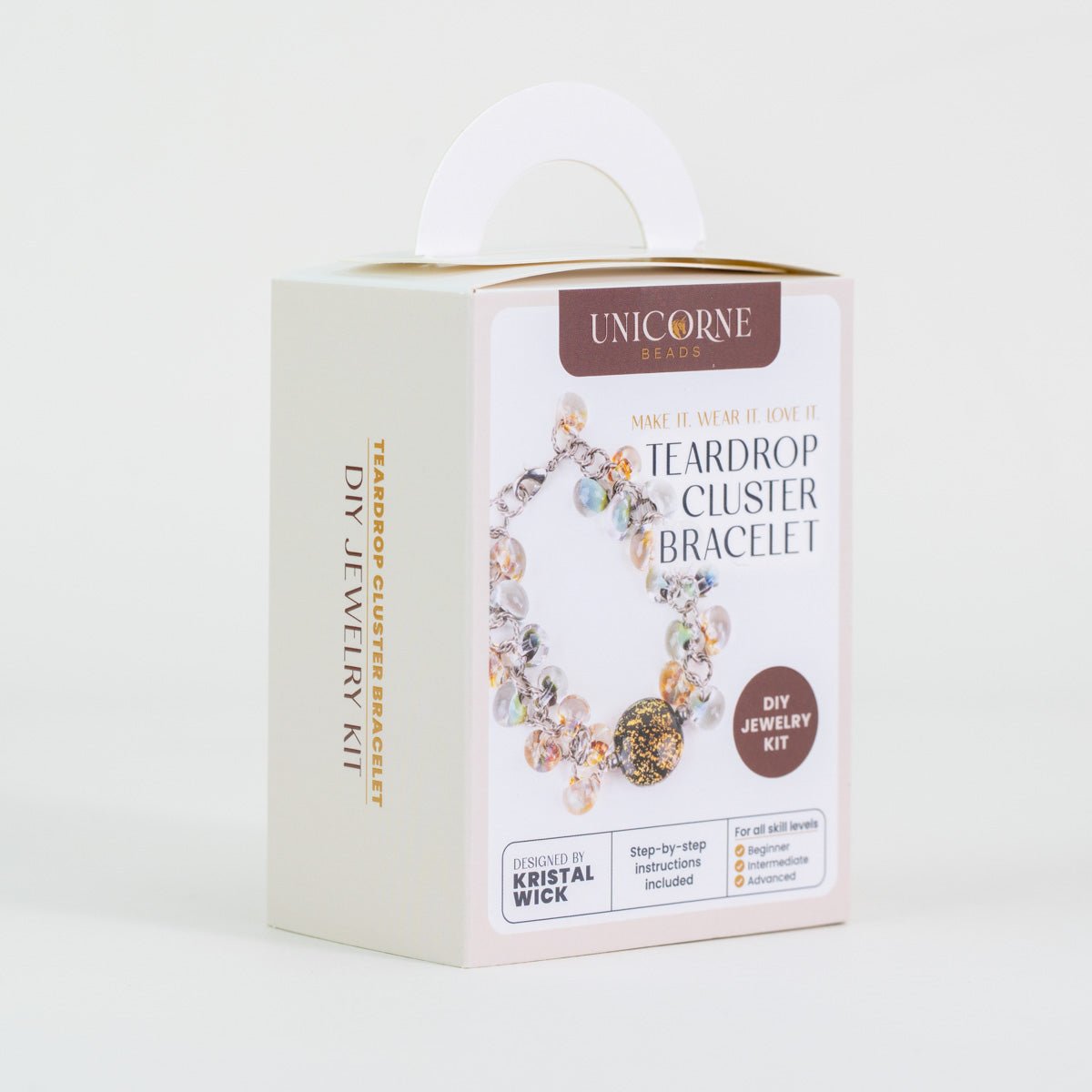 DIY jewelry kit to make a Moss and Ember teardrop cluster bracelet with glass beads