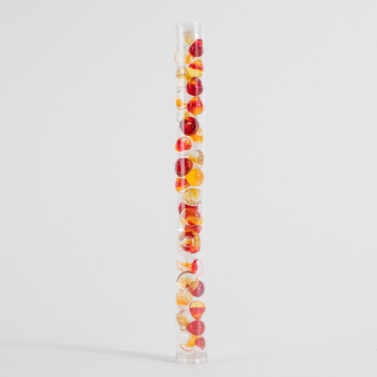 Warm color glass bead palette with red, yellow, and clear teardrop beads