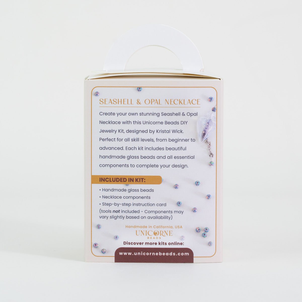 Close up of glass seashell focal with opal accents necklace