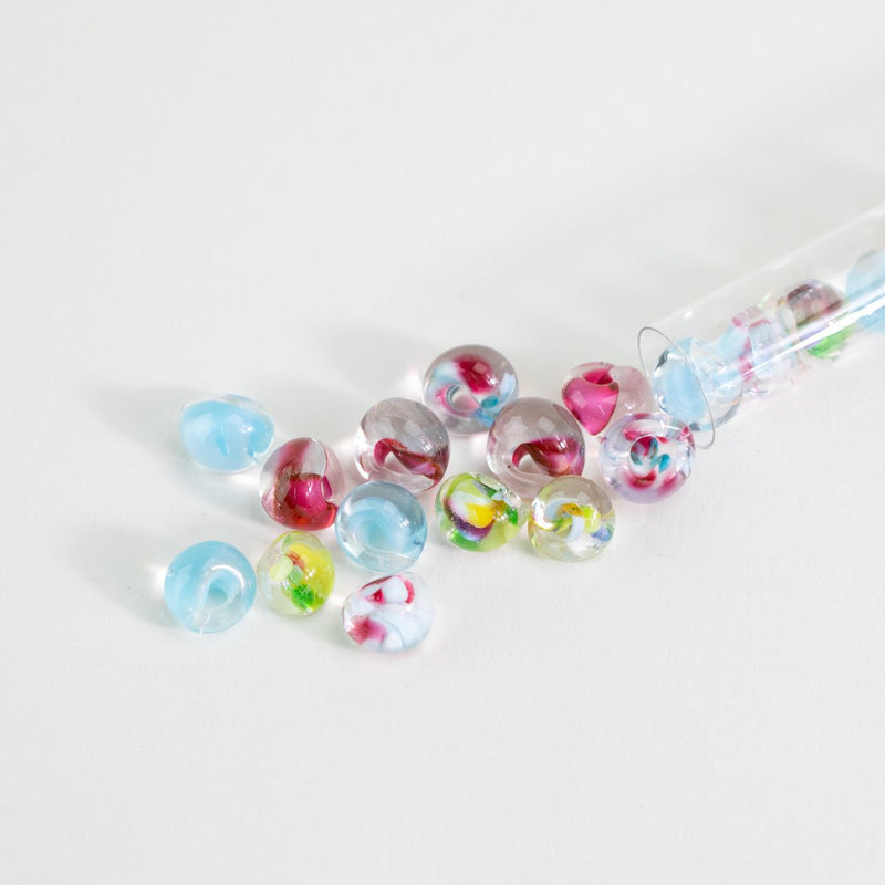 handmade lampwork teardrop beads with transparent glass and colorful swirl details