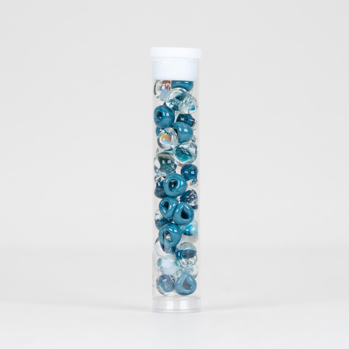 Unicorne Beads mini teardrop glass bead on plain white background