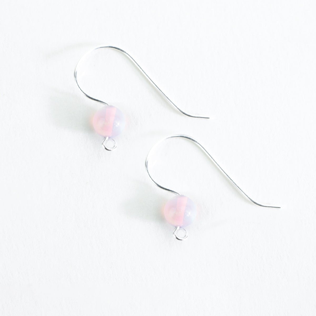 DIY Pink Stardust opal ear wire earrings made with handmade glass beads