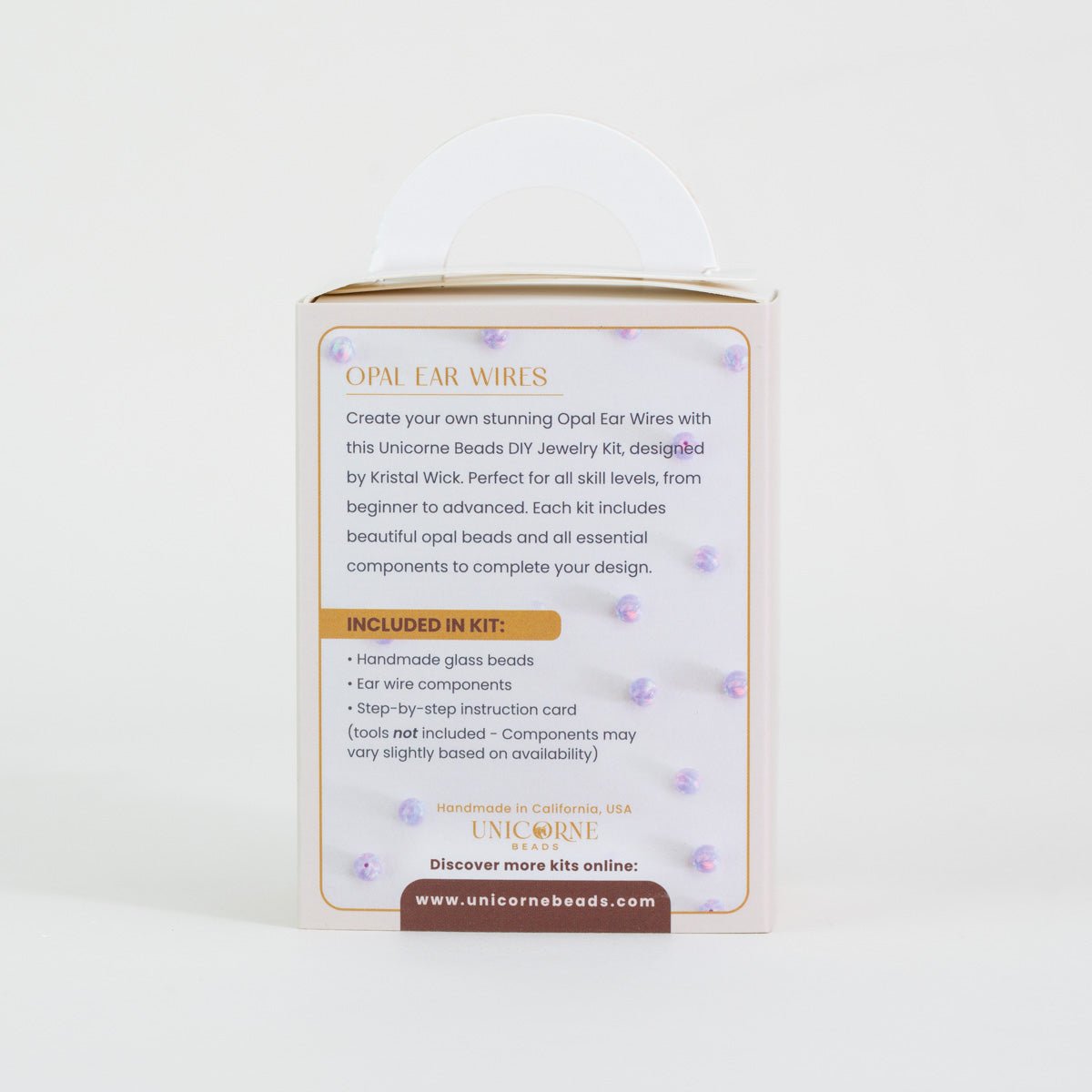 The backside of the packaging for the purple opal ear wire kits by Unicorne Beads